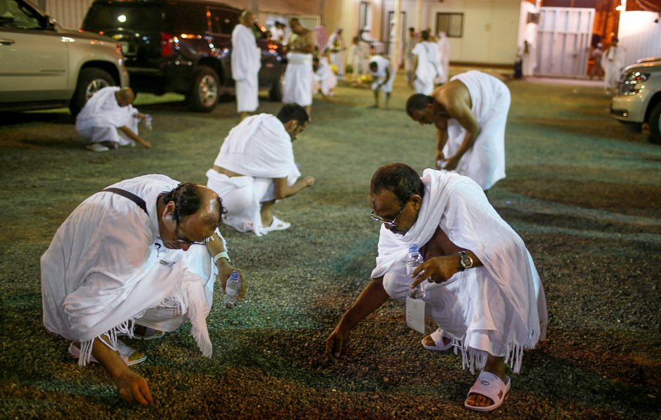 pilgrims gather stones to be used to throw at marks symbolising satan photo reuters