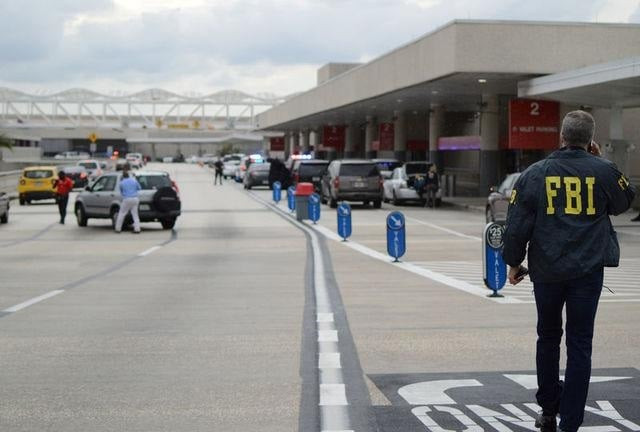 law enforcement walk outside a terminal after a shooter opened fire at a baggage carousel at fort lauderdale hollywood international airport in florida january 6 2017 photo reuters zachary fagenson law enforcement walk outside a terminal after a shooter opened fire at a baggage carousel at fort lauderdale hollywood international airport in florida january 6 2017 photo reuters zachary fagenson