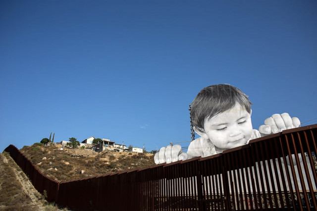 view of an artwork by french artist jr on the us mexico border in tecate california united states photo afp