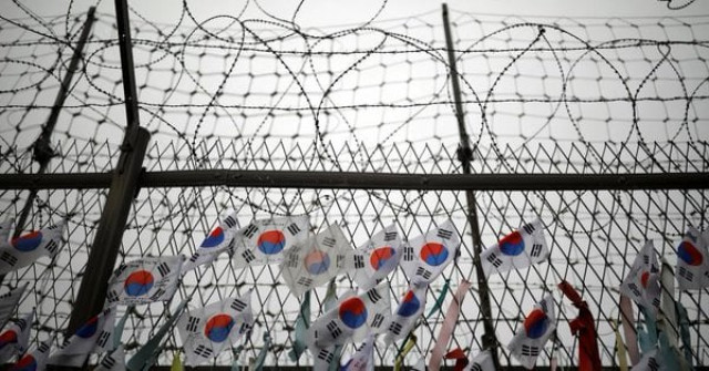 south korean national flags hang on a barbed wire fence near the demilitarized zone separating the two koreas in paju south korea august 14 2017 photo reuters south korean national flags hang on a barbed wire fence near the demilitarized zone separating the two koreas in paju south korea august 14 2017 photo reuters