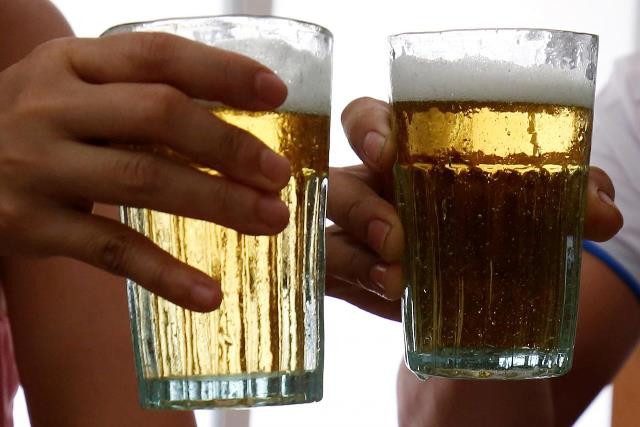 customers hold glasses of draught beer at a restaurant in hanoi vietnam june 24 2017 photo reuters file customers hold glasses of draught beer at a restaurant in hanoi vietnam june 24 2017 photo reuters file