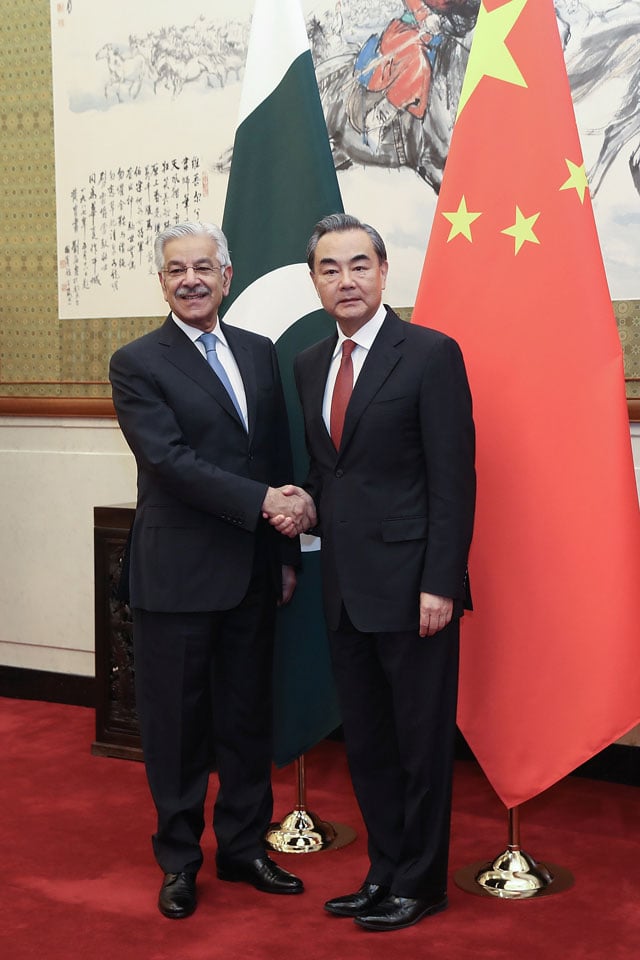 chinese foreign minister wang yi r shakes hands with foreign minister khawaja asif l at diaoyutai state guesthouse on september 8 2017 in beijing china photo afp