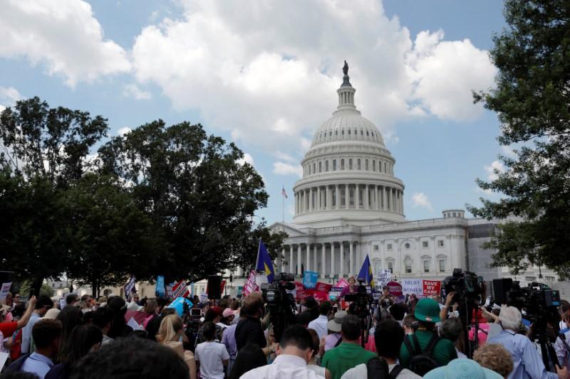protestors gather during a demonstration against the republican repeal of the affordable care act outside the us capitol in washington u s june 21 2017 photo reuters