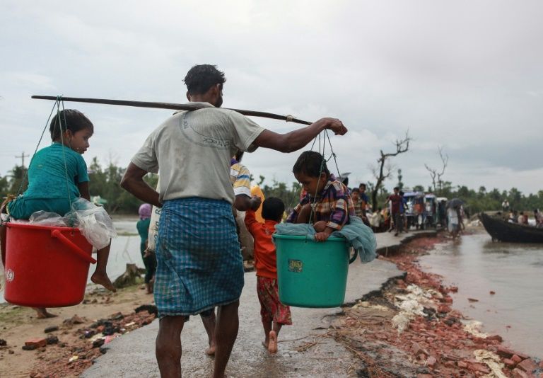 rohingya rebels call one month myanmar ceasefire as exodus grows photo afp