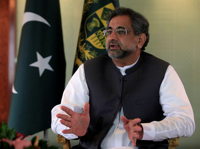 prime minister shahid khaqan abbasi speaks with a reuters correspondent during an interview at his office in islamabad september 11 2017 photo reuters