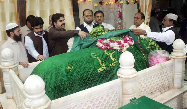 sindh minister for information labour and transport nasir hussain shah lays a floral wreath at the mazar of abdullah shah ghazi photo online sindh minister for information labour and transport nasir hussain shah lays a floral wreath at the mazar of abdullah shah ghazi photo online