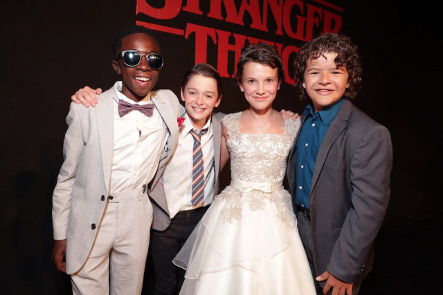 caleb mclaughlin noah schnapp millie brown gaten matarazzo seen at a red carpet premiere photo file caleb mclaughlin noah schnapp millie brown gaten matarazzo seen at a red carpet premiere photo file
