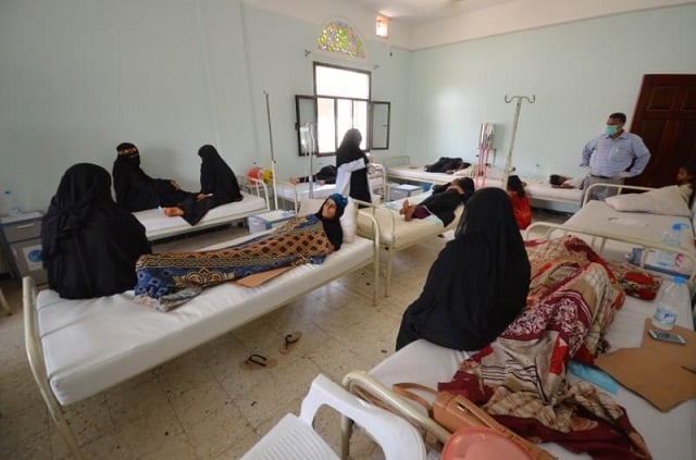 women sit with relatives infected with cholera at a hospital in the red sea port city of hodeidah yemen may 14 2017 photo reuters abduljabbar zeyad