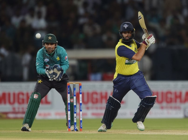 world xi batsman hashim amla r plays a shot as pakistani captain and wicketkeeper sarfraz ahmad looks on during the second twenty20 international match between the world xi and pakistan at the gaddafi cricket stadium in lahore on september 13 2017 photo afp world xi batsman hashim amla r plays a shot as pakistani captain and wicketkeeper sarfraz ahmad looks on during the second twenty20 international match between the world xi and pakistan at the gaddafi cricket stadium in lahore on september 13 2017 photo afp