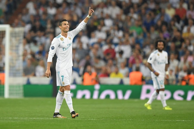 real madrid 039 s forward from portugal cristiano ronaldo celebrates after scoring during the uefa champions league football match real madrid cf vs apoel fc at the santiago bernabeu stadium in madrid on september 13 2017 photo afp real madrid 039 s forward from portugal cristiano ronaldo celebrates after scoring during the uefa champions league football match real madrid cf vs apoel fc at the santiago bernabeu stadium in madrid on september 13 2017 photo afp