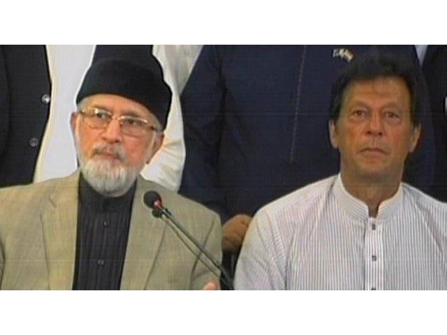 imran khan and tahirul qadri address a joint press conference in lahore on september 14 express news screen grab