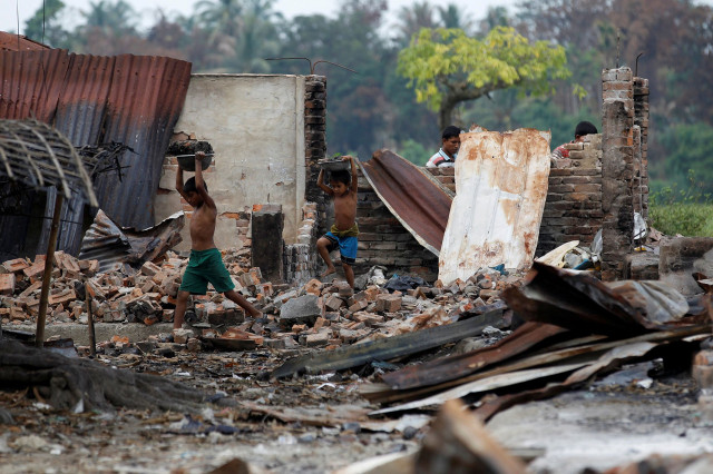 rohingya children rummaged last october through the ruins of a village market that was set on fire during the army 039 s quot clearance operation quot in rakhine state photo reuters rohingya children rummaged last october through the ruins of a village market that was set on fire during the army 039 s quot clearance operation quot in rakhine state photo reuters