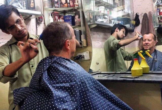 german ambassador martin kobler gets a quick trim from a local barber on his visit to peshawar earlier this week photo express german ambassador martin kobler gets a quick trim from a local barber on his visit to peshawar earlier this week photo express