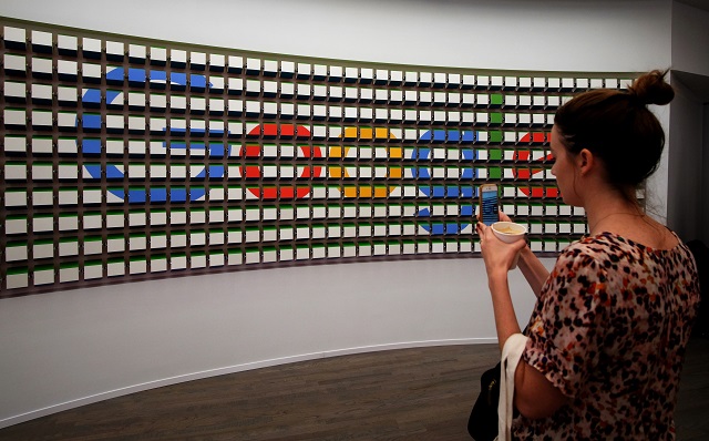 this photo taken on october 20 2016 shows a woman taking pictures after the opening of google 039 s pop up store in new york a trio of former google employees on september 14 2017 filed a lawsuit accusing the technology giant of paying women less than men for the same work the lawsuit filed in a san francisco state court on behalf of the three women accused google of quot systemic and pervasive pay and promotion discrimination against its female employees quot in california photo afp