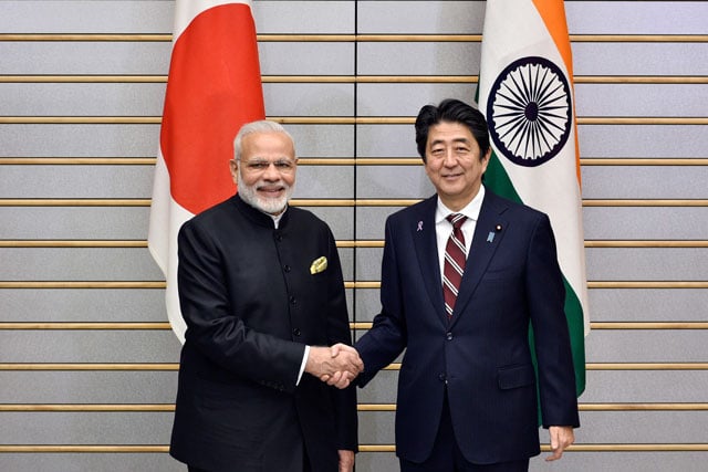 india 039 s prime minister narendra modi l shakes hands with his japanese counterpart shinzo abe at the start of their meeting at abe 039 s official residence in tokyo on november 11 2016 photo afp