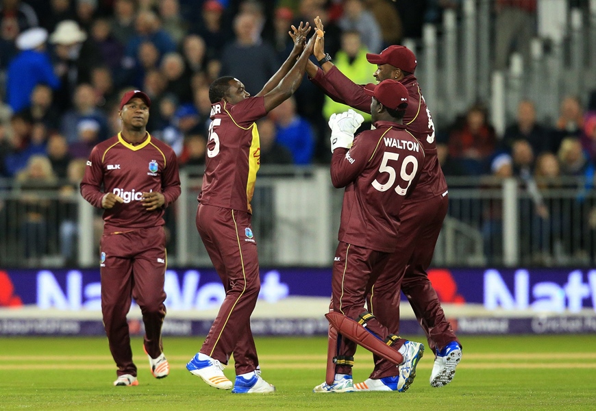 west indies 039 jerome taylor 2nd l celebrates with teammates after taking the wicket of jason roy first ball during the t20 international cricket match between england and west indies at the emirates riverside chester le street in north east england on september 16 2017 photo afp