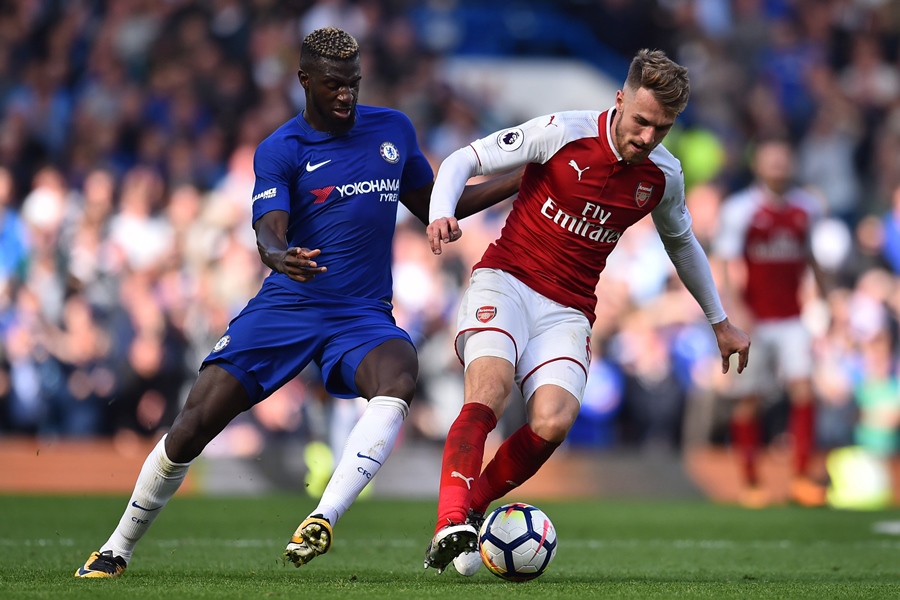 arsenal 039 s welsh midfielder aaron ramsey r vies with chelsea 039 s french midfielder tiemoue bakayoko during the english premier league football match between chelsea and arsenal at stamford bridge in london on september 17 2017 photo afp