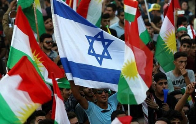 an israeli flag is waved alongside kurdish flags during an event in iraqi kurdistan 039 s capital of arbil to urge people to vote in a september 25 independence referendum photo afp