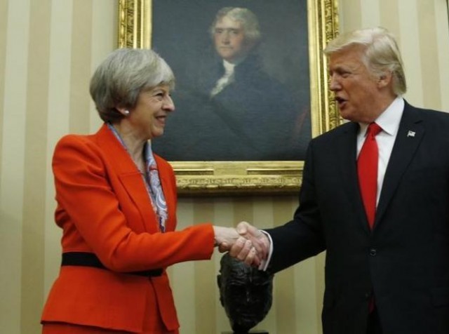 us president donald trump greets british prime minister theresa may in the white house oval office in washington u s january 27 2017 photo reuters