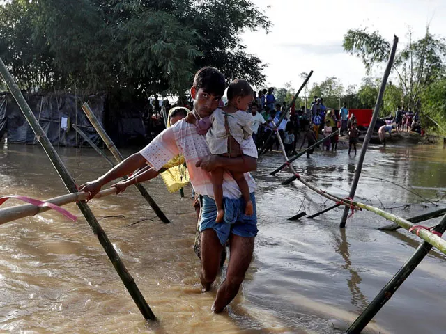 rohingya cross a swollen river at a refugee camp in cox 039 s bazar bangladesh september 17 2017 photo reuters rohingya cross a swollen river at a refugee camp in cox 039 s bazar bangladesh september 17 2017 photo reuters