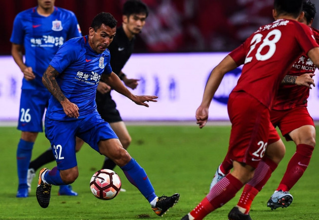 shenhua coach wu is hopeful tevez will belatedly come good to rescue a team that has lost five csl matches on the trot and is in crisis photo afp
