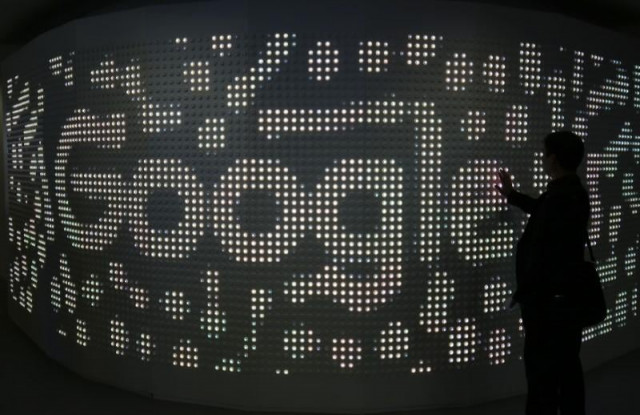 an attendee interacts with an illuminated panel at google stand during the mobile world congress in barcelona spain march 1 2017 photo reuters an attendee interacts with an illuminated panel at google stand during the mobile world congress in barcelona spain march 1 2017 photo reuters