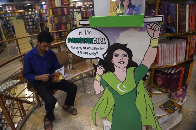 pakistan 039 s newest female superhero has vowed to battle venal officials and protect battered women photo afp