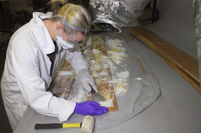 this undated handout from the australian federal police released on april 5 2017 shows crystal methamphetamine being removed from planks of wood at a warehouse in the melbourne suburb of nunawading where it was hidden in 70 boxes of floorboards shipped from china cooperation with china and other key drug producing nations will be bolstered under a new strategy unveiled on september 19 2017 to combat a flood of crystal meth into australia that has seen ice use triple in five years photo afp