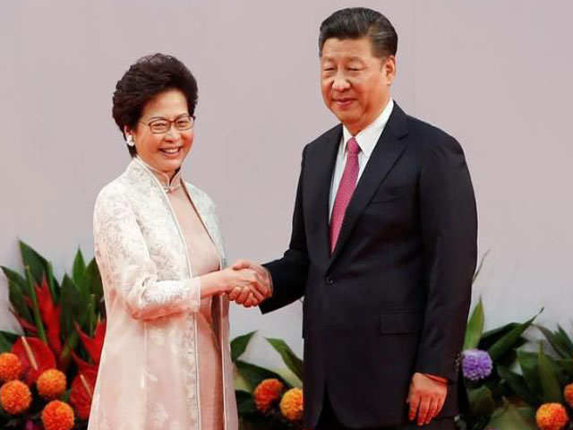 hong kong chief executive carrie lam shakes hands with chinese president xi jinping after she swore an oath of office on the 20th anniversary of the city 039 s handover from british to chinese rule in hong kong china july 1 2017 photo reuters