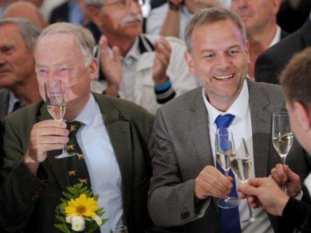 top candidate leif erik holm and alexander gauland of the anti immigration party alternative for germany afd react after first exit polls during the mecklenburg vorpommern state election at the party post election venue in schwerin germany september 4 2016 photo reuters