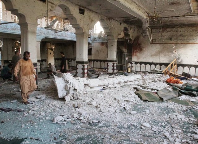 relatives inspect after an overnight suicide attack at a mosque in herat afghanistan august 2 2017 photo reuters mohammad shoib