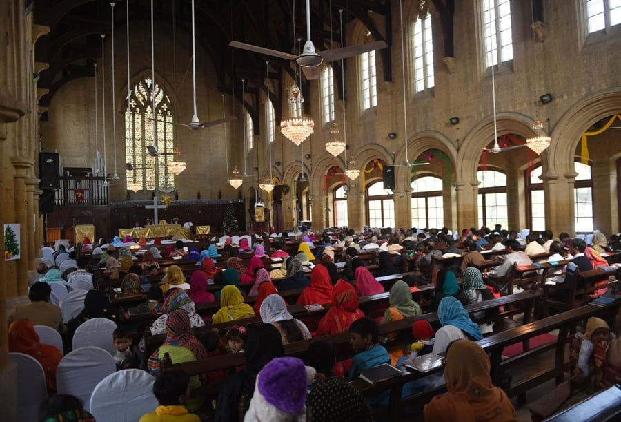 christians attend a christmas mass at st patrick 039 s cathedral in karachi on december 25 2014 photo afp