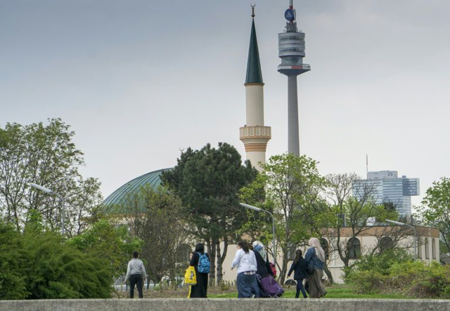 muslim women with children walk towards a mosque at the islam centre of vienna islamophobia is being openly used by political parties in the catholic dominated country ahead of next month 039 s parliamentary poll photo afp