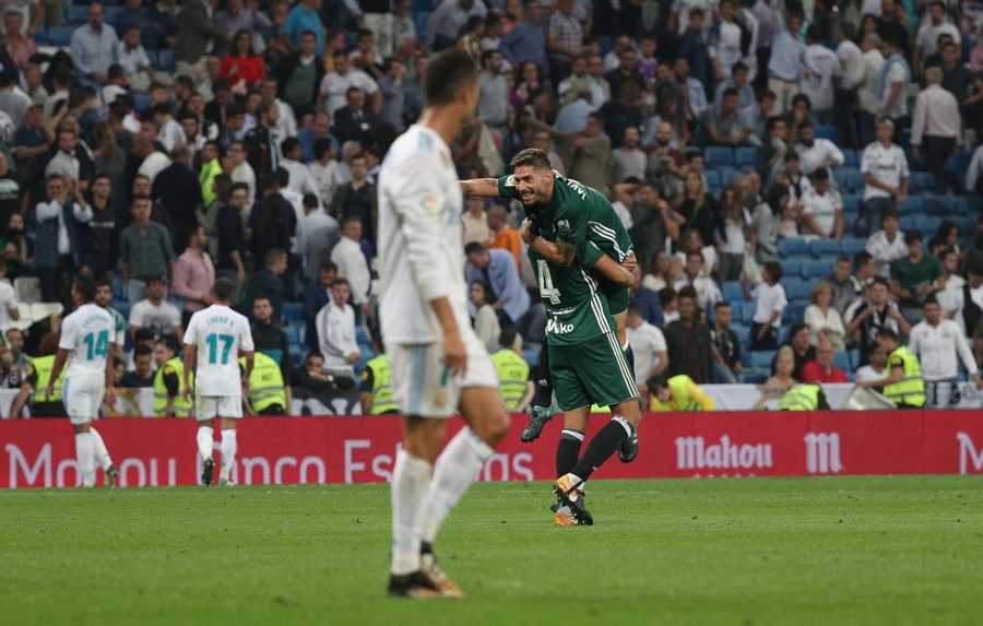 real betis 039 javi garcia and zouhair feddal celebrate their first goal as real madrid 039 s cristiano ronaldo looks on photo reuters