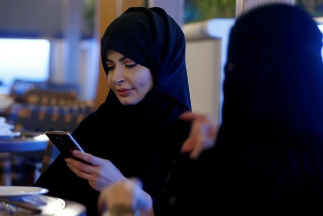 representative image a woman uses her mobile phone in a cafe in riyadh saudi arabia october 6 2016 picture taken october 6 2016 photo reuters representative image a woman uses her mobile phone in a cafe in riyadh saudi arabia october 6 2016 picture taken october 6 2016 photo reuters