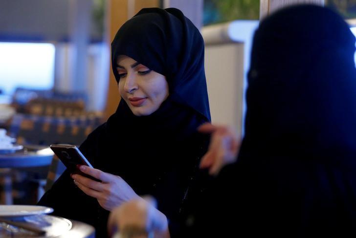 representative image a woman uses her mobile phone in a cafe in riyadh saudi arabia october 6 2016 picture taken october 6 2016 photo reuters