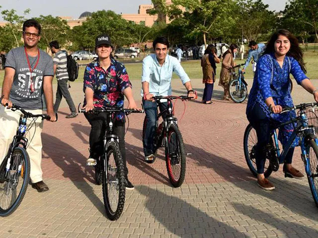 a group of students riding bikes at the soft launch of cykiq at nust campus islamabad pakistan on may 2017 photo reuters a group of students riding bikes at the soft launch of cykiq at nust campus islamabad pakistan on may 2017 photo reuters