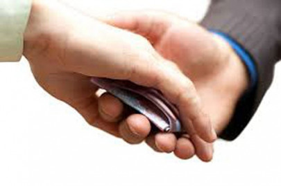 merely passing laws to fight corruption not enough