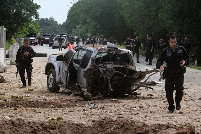 thai army rangers walk through the scene of a roadside bomb which killed four army rangers in the restive southern thai province of pattani on september 22 2017 four thai army rangers were killed friday when a roadside bomb tore through their truck as they were securing a road for teachers an army official said the latest carnage in an insurgency roiling the kingdom 039 s far south photo afp thai army rangers walk through the scene of a roadside bomb which killed four army rangers in the restive southern thai province of pattani on september 22 2017 four thai army rangers were killed friday when a roadside bomb tore through their truck as they were securing a road for teachers an army official said the latest carnage in an insurgency roiling the kingdom 039 s far south photo afp