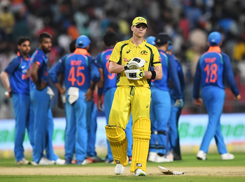 australia 039 s captian steve smith c reacts as indian cricketers celebrate the wicket of australia 039 s travis head during the second one day international odi match of the ongoing india australia cricket series at the eden gardens cricket stadium in kolkata on september 21 2017 photo afp