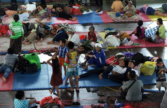 villagers rest after being evacuated during the raised alert levels for the volcano on mount agung in klungkung regency on the indonesian resort island of bali on september 22 2017 authorities have raised alert levels for a volcano on the indonesian resort island of bali after hundreds of small tremors stoked fears it could erupt for the first time in more than 50 years photo afp villagers rest after being evacuated during the raised alert levels for the volcano on mount agung in klungkung regency on the indonesian resort island of bali on september 22 2017 authorities have raised alert levels for a volcano on the indonesian resort island of bali after hundreds of small tremors stoked fears it could erupt for the first time in more than 50 years photo afp