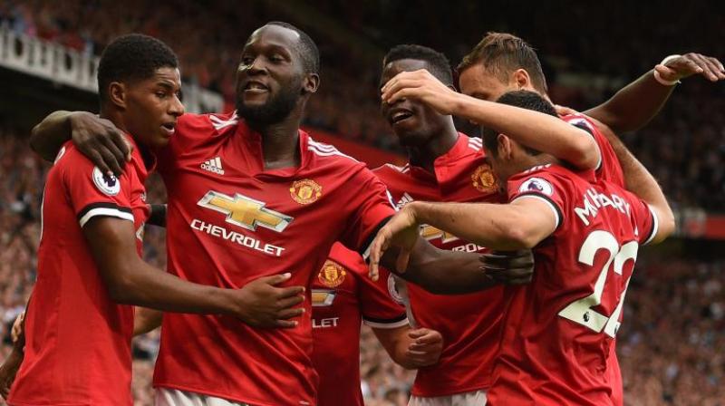 with romelu lukaku scoring seven since his close season move from everton and marcus rashford and anthony martial also among the goals united look capable of winning the title for the first time since 2013 photo afp