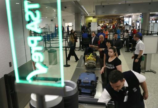 us customs computer collapse leaves thousands of travelers waiting photo afp