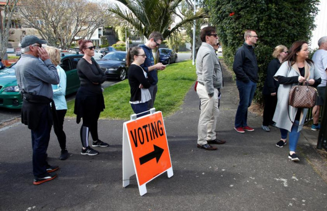 voters wait outside a polling station at the st heliers tennis club during the general election in auckland new zealand september 23 2017 photo reuters voters wait outside a polling station at the st heliers tennis club during the general election in auckland new zealand september 23 2017 photo reuters