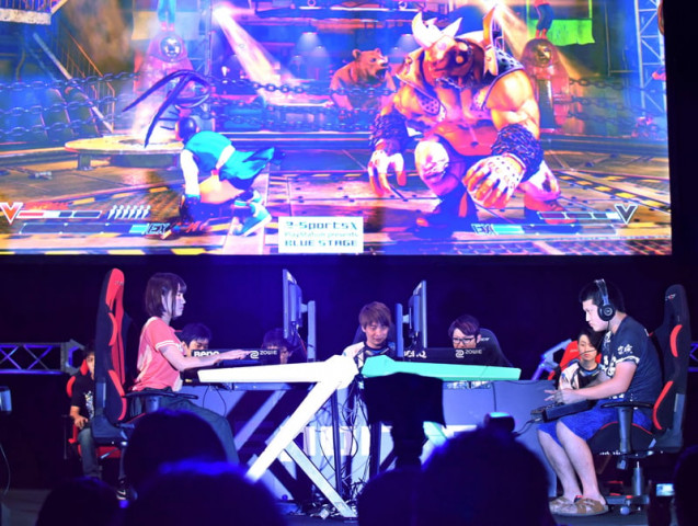 this photo taken on september 21 2017 shows star game players fight at an esports game event at the tokyo game show in chiba city in suburban tokyo photo afp this photo taken on september 21 2017 shows star game players fight at an esports game event at the tokyo game show in chiba city in suburban tokyo photo afp