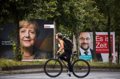 bring home the bacon merkel tells voters on eve of poll bring home the bacon merkel tells voters on eve of poll