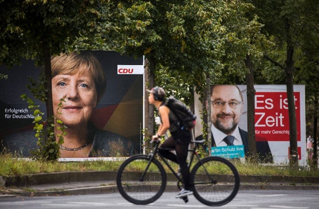 polls show german chancellor angela merkel heading for victory over social democratic rival martin schulz as both make a final campaign push    but also the hard right alternative for germany winning around 60 seats photo afp