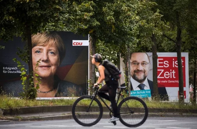 polls show german chancellor angela merkel heading for victory over social democratic rival martin schulz as both make a final campaign push but also the hard right alternative for germany winning around 60 seats photo afp polls show german chancellor angela merkel heading for victory over social democratic rival martin schulz as both make a final campaign push but also the hard right alternative for germany winning around 60 seats photo afp