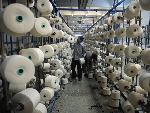 urges value addition in textile exports modernisation of manufacturing units photo afp