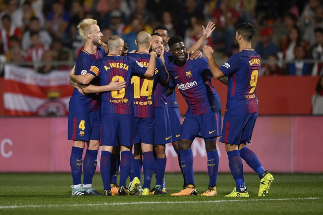 easy does it barcelona were rarely troubled in 3 0 win over fellow catalan side girona photo afp easy does it barcelona were rarely troubled in 3 0 win over fellow catalan side girona photo afp